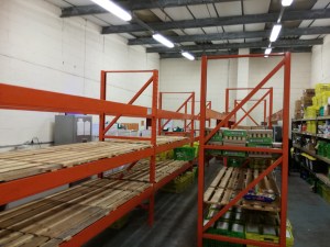 Donated shelving in the TRJFPBrum warehouse