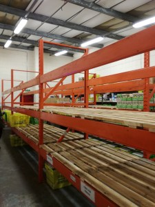 Donated shelving in the TRJFPBrum warehouse
