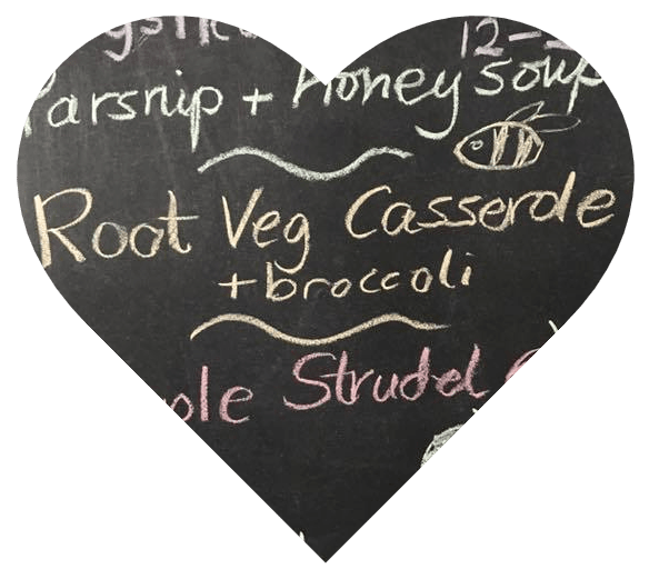 Heart showing a sample Pay As You Feel menu on a blackboard